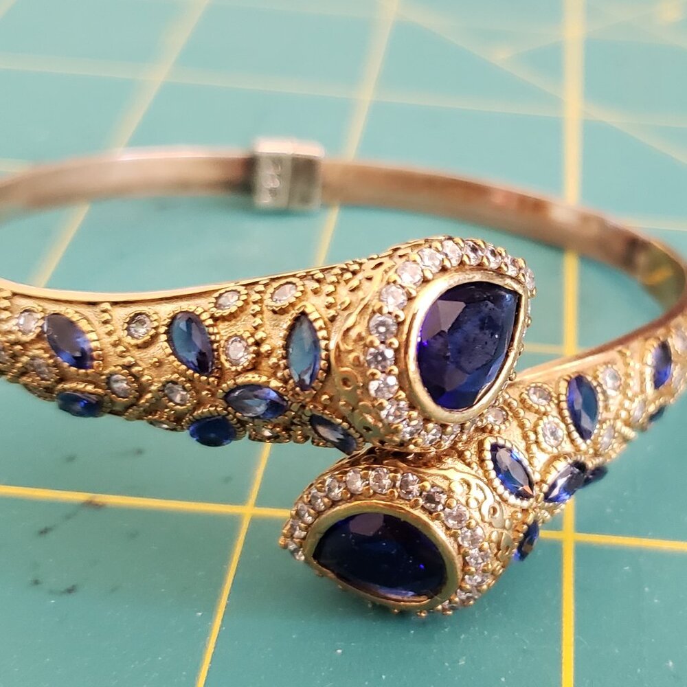 Bracelet, gold and silver metal, navy blue stones
